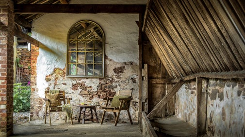 The covered outdoor seating area at Cross Lane House, Somerset